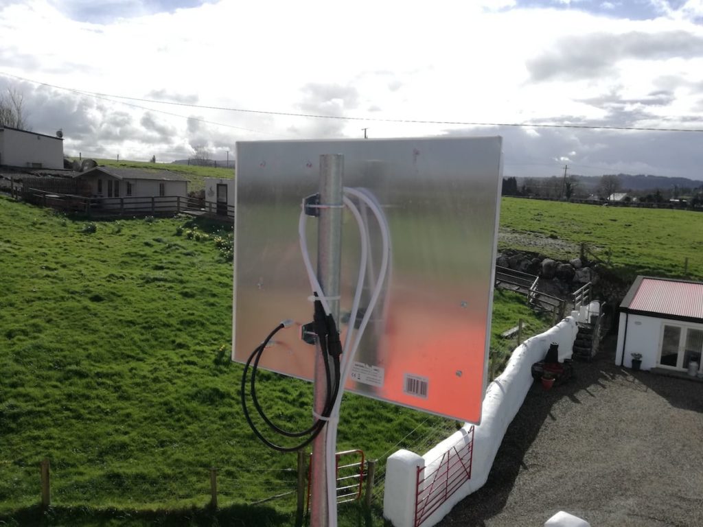 A Cellnet antenna mounted on a location in Corofin, with a view of the surrounding countryside.